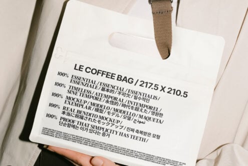 Mockup of Le Coffee Bag with multilingual typography design emphasizing essential and timeless qualities for graphic designers and digital asset creators.