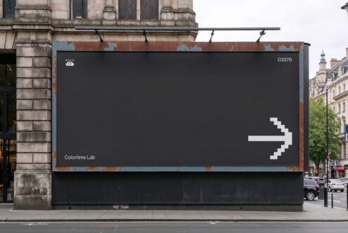 Urban billboard mockup with blank black surface and digital arrow design. Ideal for advertisement, showcasing graphics, templates, and creative projects.