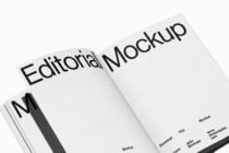 Clean open editorial mockup with blank white pages, minimal typography
