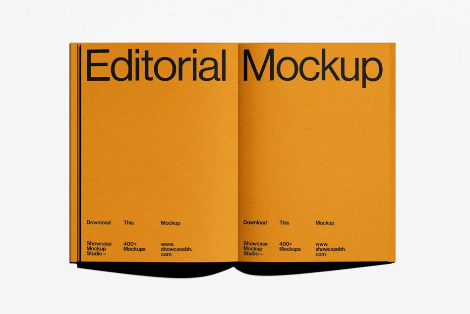 Open magazine mockup with orange pages and bold black text. Ideal for showcasing editorial designs and layouts. Perfect for graphic and web designers.