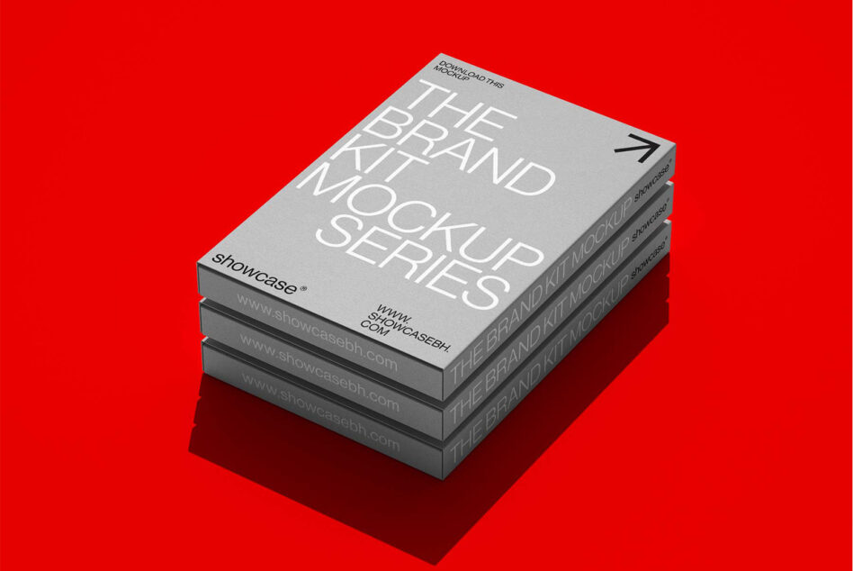 Stack of brand kit mockup books on a vibrant red background perfect for designers looking for mockup templates subtle shadows enhance depth