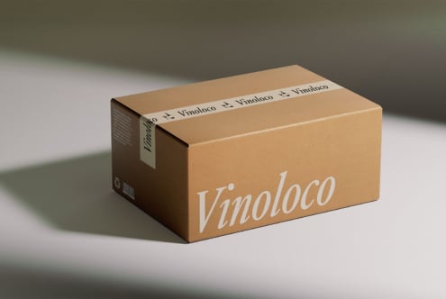 Cardboard box mockup featuring Vinoloco branding design ideal for packaging projects. Keywords: mockup, packaging, design, cardboard, branding.
