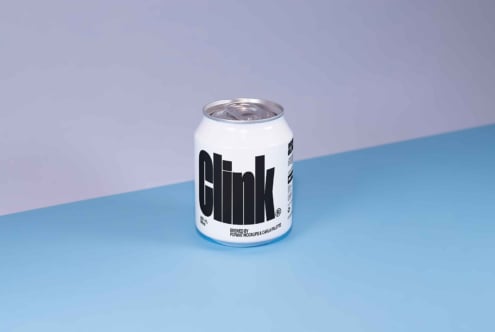 Mockup of a white beverage can with bold black typography on a blue surface background. Ideal for branding, packaging design, and product presentation.