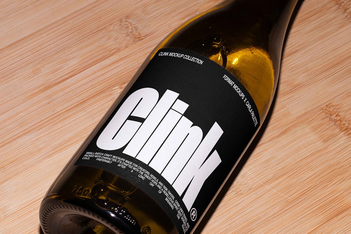 Wine bottle mockup featuring bold typography on a black label with a modern design on a wooden surface. Ideal for branding and packaging designs.