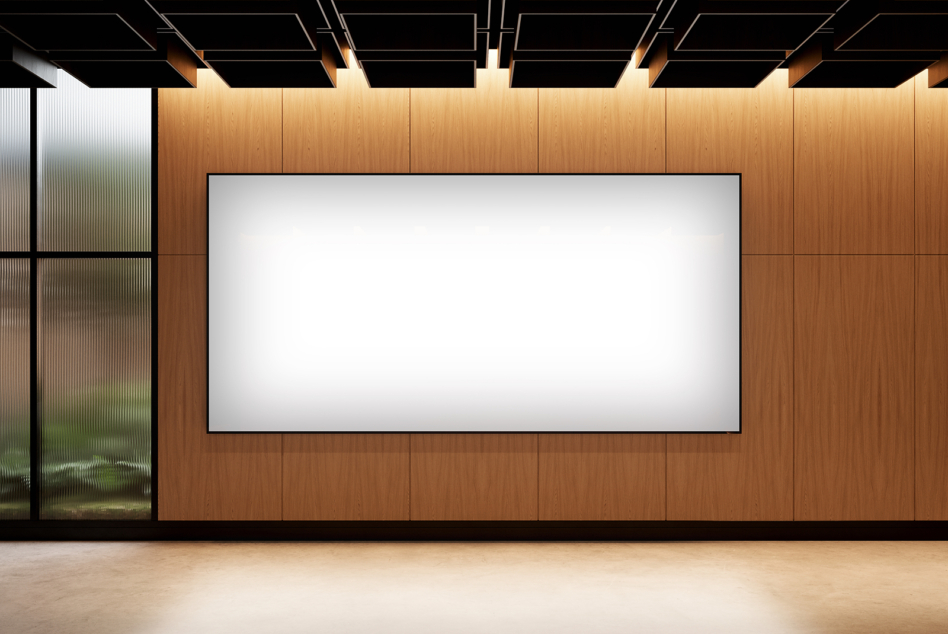 Large interior display wall with white screen, wood cladding, recessed lighting