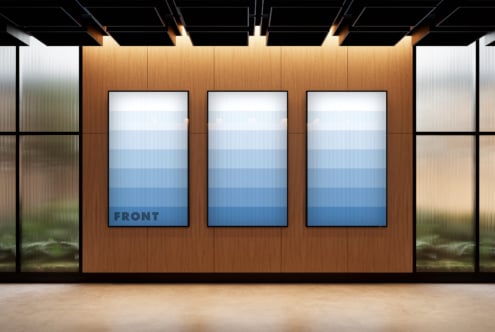 Modern interior mockup featuring three vertically aligned blue posters on a wood panel wall. Ideal for design presentations. Interior design graphics.