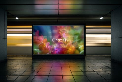 Digital poster mockup in a subway station with vibrant abstract floral design, ideal for showcasing graphics templates for designers. Colorful and modern.