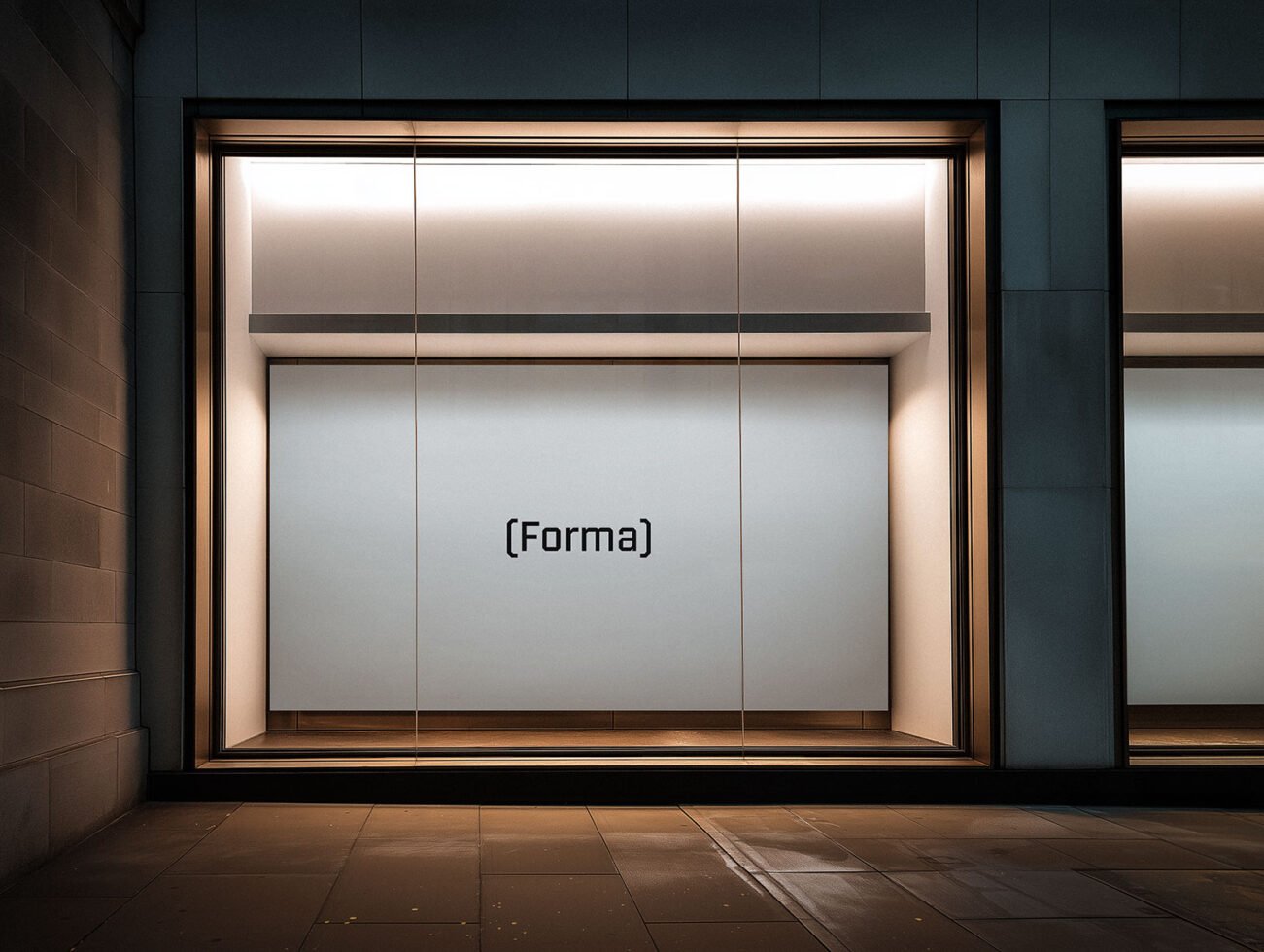 Minimalist storefront mockup with large glass windows displaying the word Forma. Ideal for showcasing branding, advertising designs, template use.