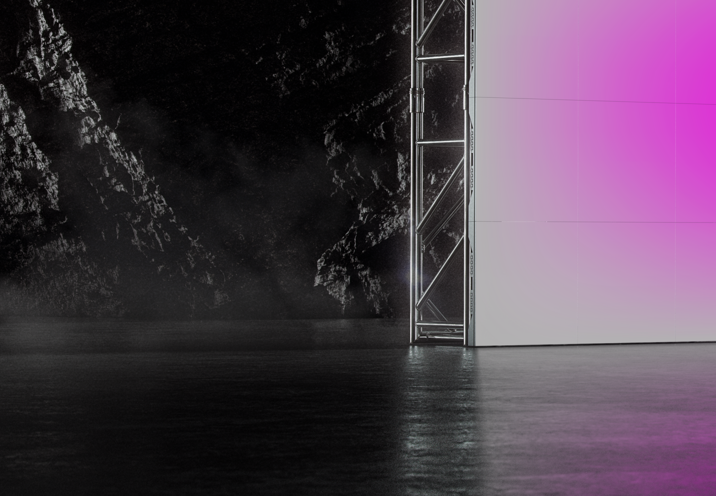 Industrial space with light panel casting pink glow on concrete floor