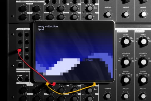 Tablet display with pixel art on a synthesizer interface. Ideal for designers seeking mockups. Keywords: digital assets, templates, design, interface.