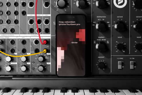 iPhone 14 Pro mockup displayed on a synthesizer panel, showcasing modern interface design. Ideal for creatives in digital graphics and UI design.