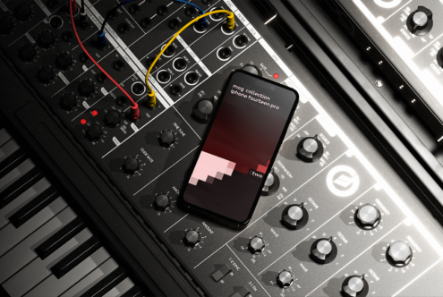 iPhone on a synth keyboard featuring a modern app interface. Ideal for designers seeking tech mockups, digital templates, and creative assets.