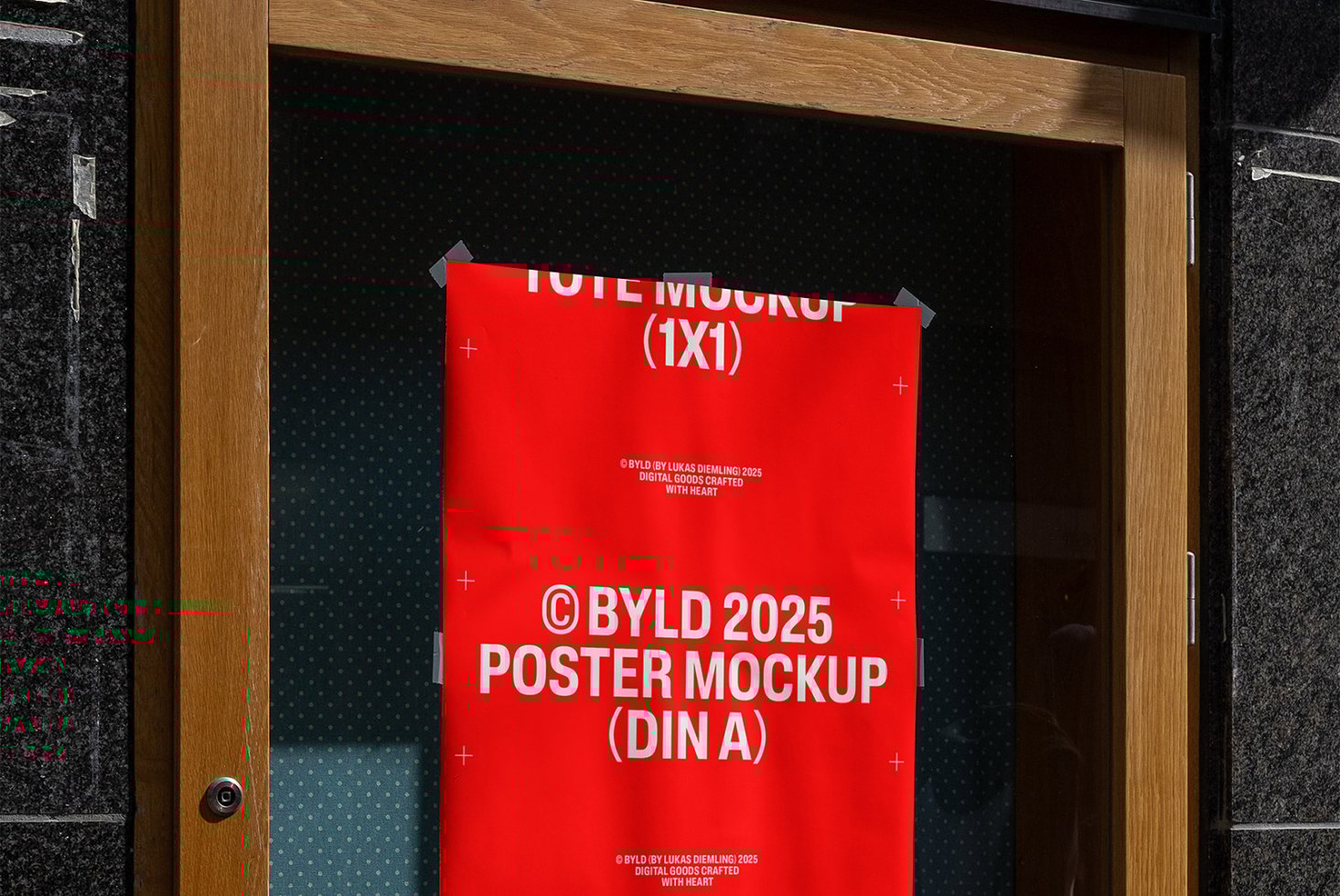 A red poster mockup placed on a wooden door perfect for showcasing DIN A sized designs. Ideal for designers looking for realistic presentation templates.