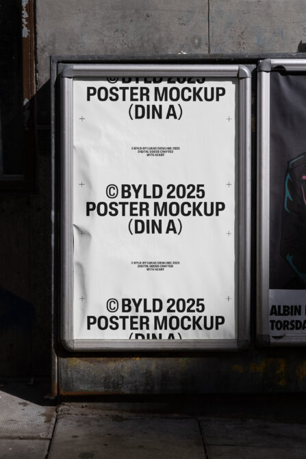Urban poster mockup display in metal frame for DIN A format design showcase. Ideal for graphic designers seeking realistic presentation templates.