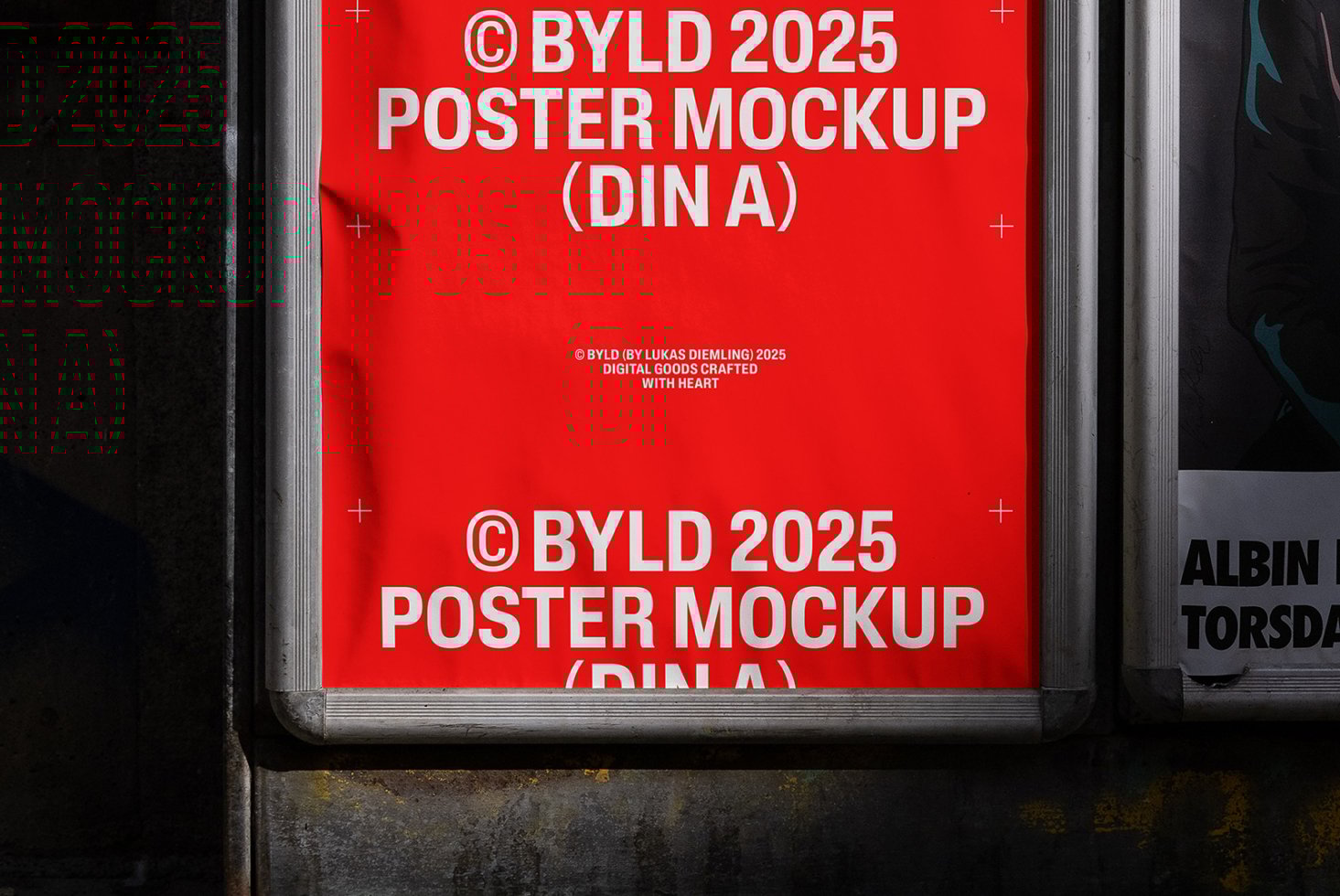 Red vertical poster mockup reading BYLD 2025 in a silver frame on a dark wall perfect for designers seeking high-quality display representations.