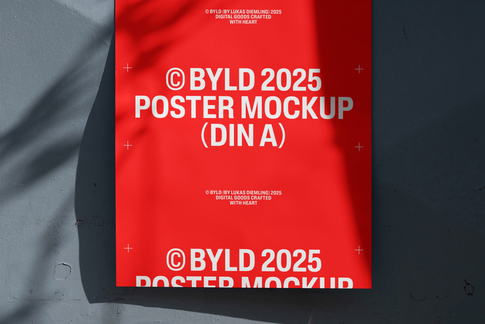 Bright red poster mockup flat lay on concrete with natural shadow