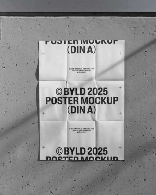 Folded white DIN A poster mockup with black text on concrete backdrop