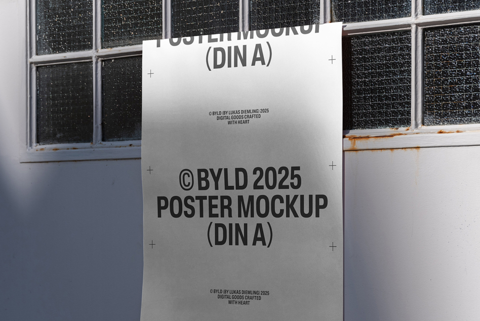 DIN A poster mockup in white on weathered industrial window background