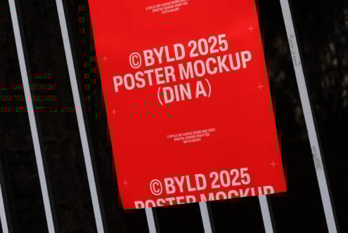 Red poster mockup for 2025 by BYLD displayed on a metallic fence ideal for showcasing design templates graphics and creative assets for designers.