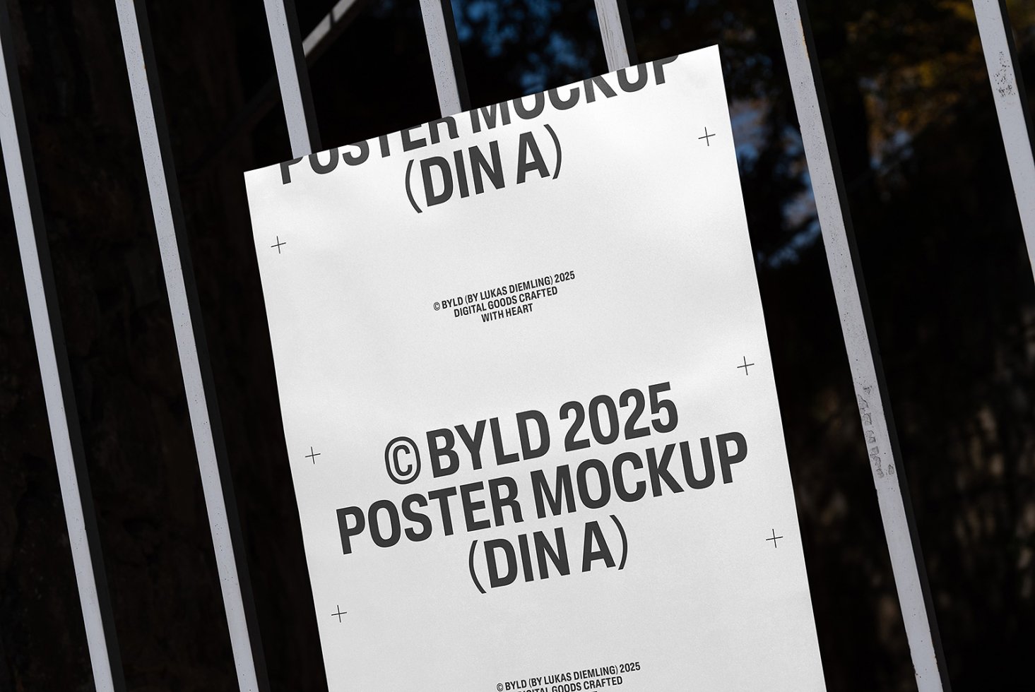Mockup of a poster on a metal fence showcasing a BYLD 2025 design. Ideal for designers looking for realistic display templates. SEO keywords: poster mockup DIN A template design.