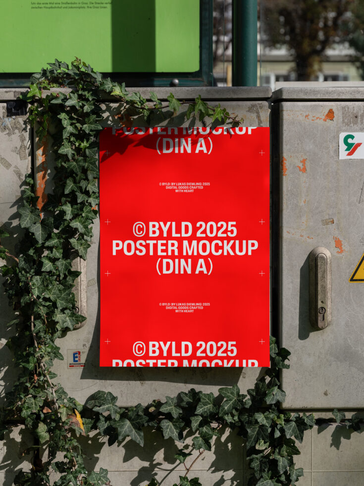 Urban poster mockup featuring red design on textured wall with ivy, great for designers needing a realistic template for showcasing artwork or ads.