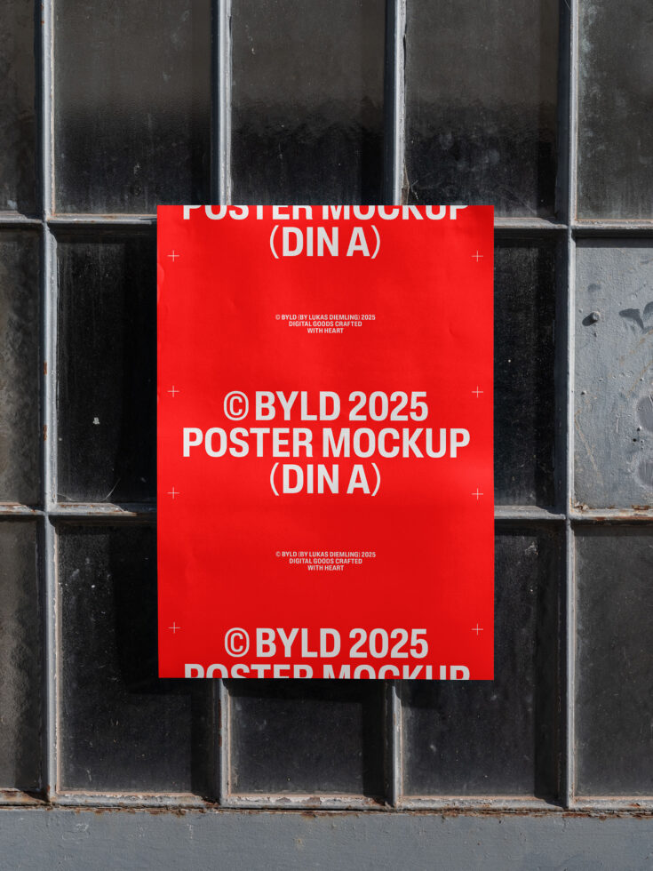 Red DIN A poster mockup on rustic window background perfect for designers seeking professional templates graphics or print mockups for digital projects.