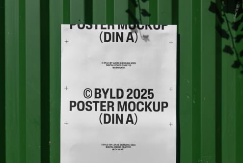 White DIN A poster mockup on green corrugated metal wall with shadow overlay