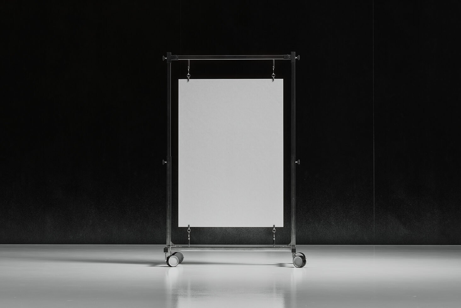 Mockup showcasing a blank poster on a mobile metal stand against a dark background, ideal for design presentations and promotional materials.