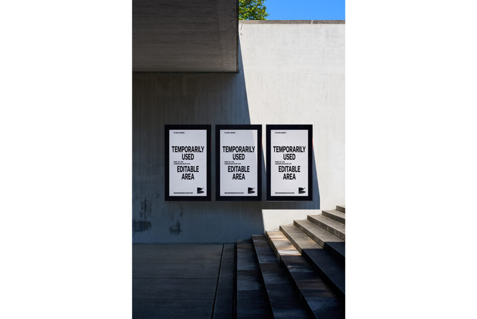 Three black framed posters on concrete wall with stairs, white editable templates