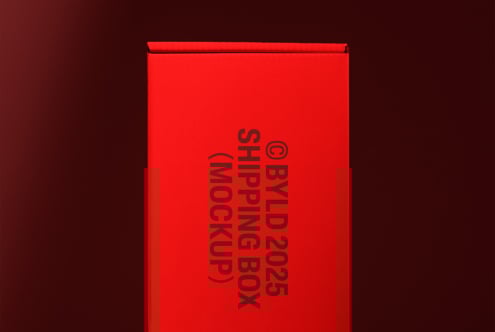 Red shipping box mockup on dark background ideal for showcasing packaging designs product presentation premium template graphic asset for designers