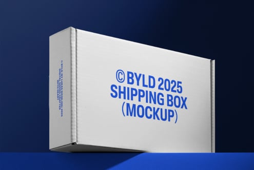 Cardboard shipping box mockup with blue text BYLD 2025 against dark blue background. Perfect for designers seeking realistic packaging templates.