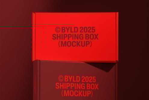 Red shipping box mockup with bold text against dark background suitable for showcasing packaging designs graphic design mockups branding digital assets