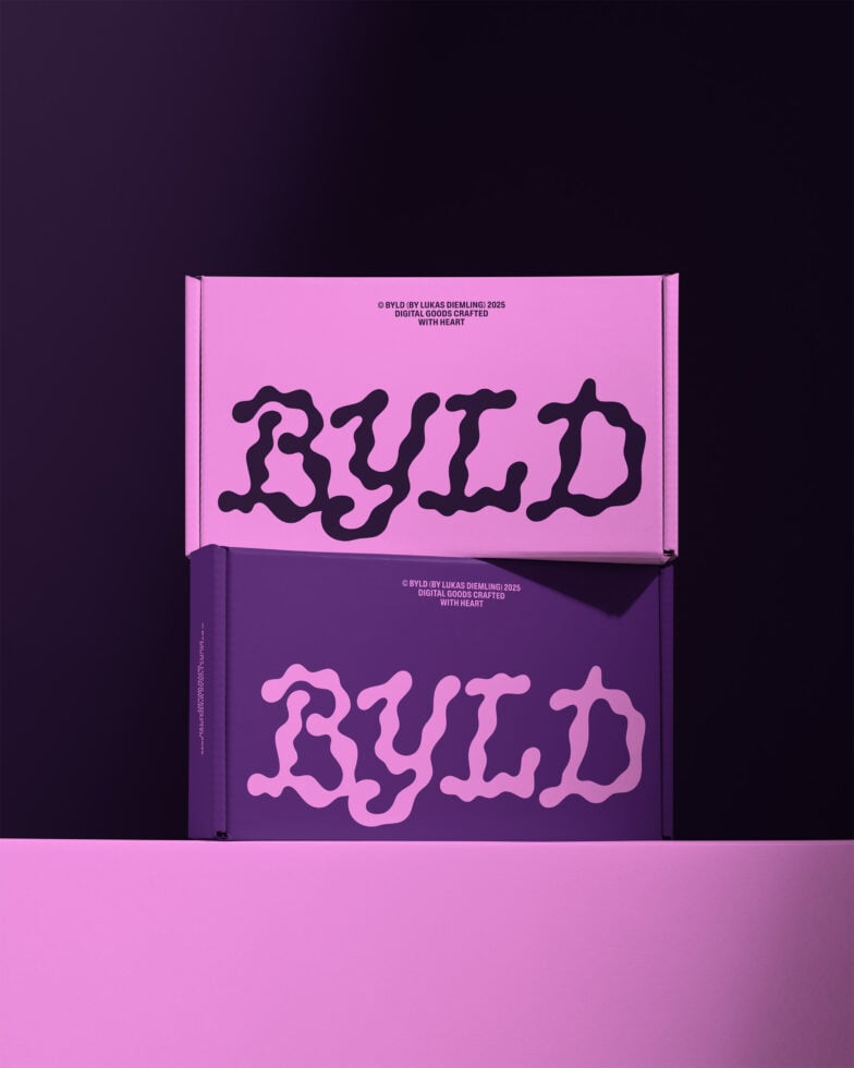 Two stacked boxes with bold blob typography on pink and purple packaging. Ideal for branding mockups, graphic design resources, and packaging templates.