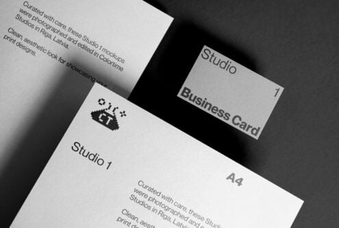 Black and white stationery mockup with A4 paper and business card on dark background. Ideal for designers seeking minimalist, professional templates.