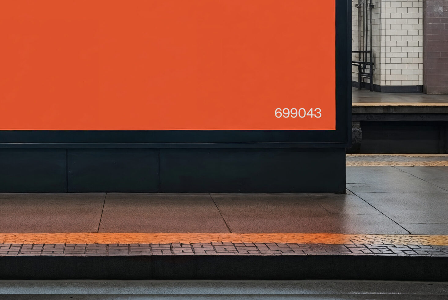 Mockup of a blank orange advertising billboard with number 699043 at a subway platform. Ideal for showcasing banner designs to graphic designers.