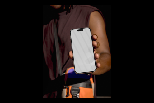 Man holding a smartphone mockup with blank screen suitable for design presentations templates or digital assets for graphic designers and UI experts.
