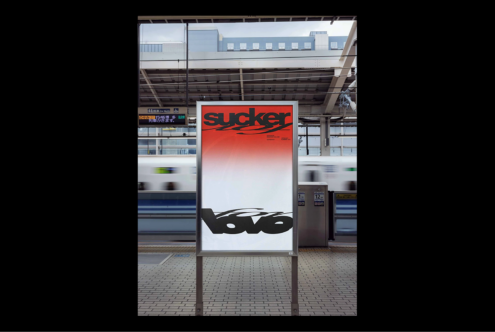 Poster mockup at a train station featuring bold typography with a red to white gradient background. Ideal for designers seeking modern graphics.