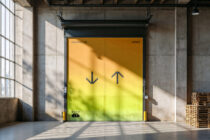 Large industrial garage doors with golden yellow fading to neon green gradient background