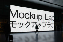 Large billboard mockup in urban setting featuring bold typography silhouette of people walking digital assets visual design mockup template for designers.