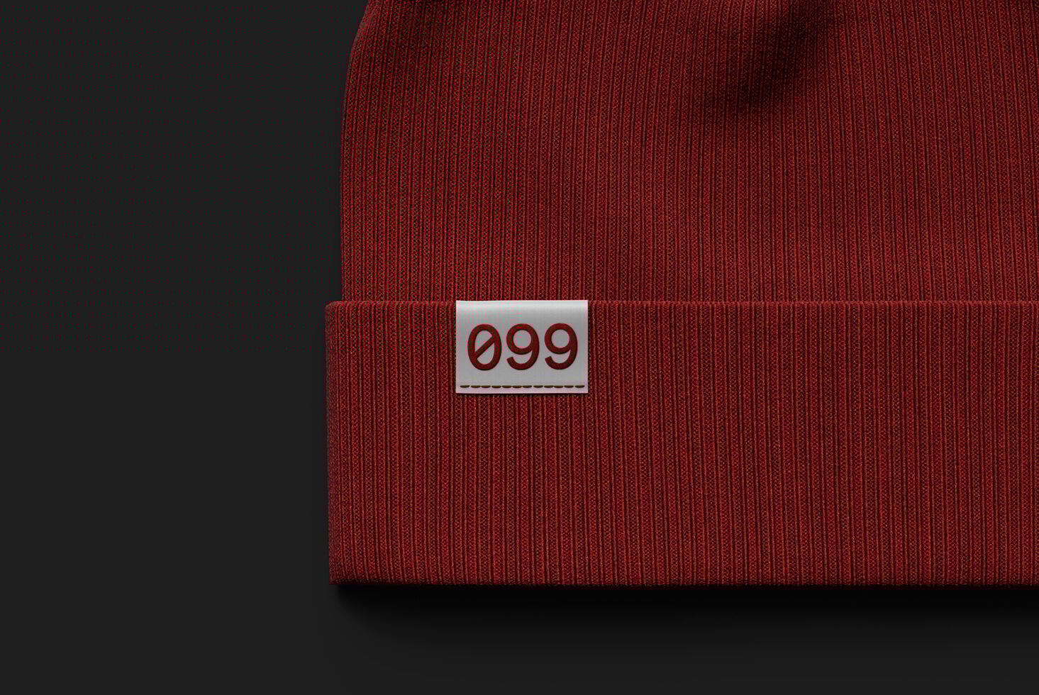 Red beanie hat mockup with a stitched label on black background perfect for apparel branding designers showcasing knit textures fashion accessories