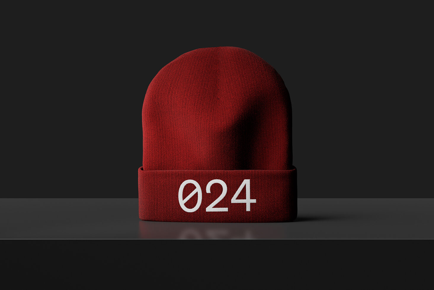 Red beanie hat mockup with the number 024 displayed on a black background ideal for designers digital assets apparel graphic templates SEO friendly