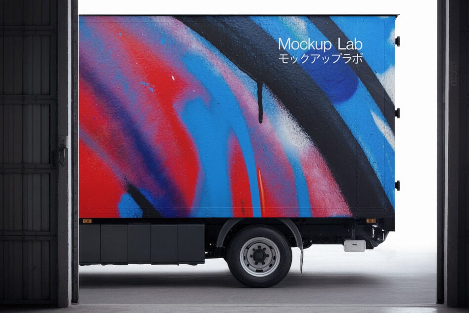 Delivery truck with colorful red blue striped design on black body
