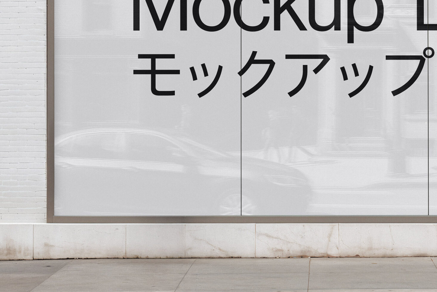 Storefront window mockup showcasing large text in English and Japanese on a clean glass surface. Ideal for branding templates and graphic design presentations.