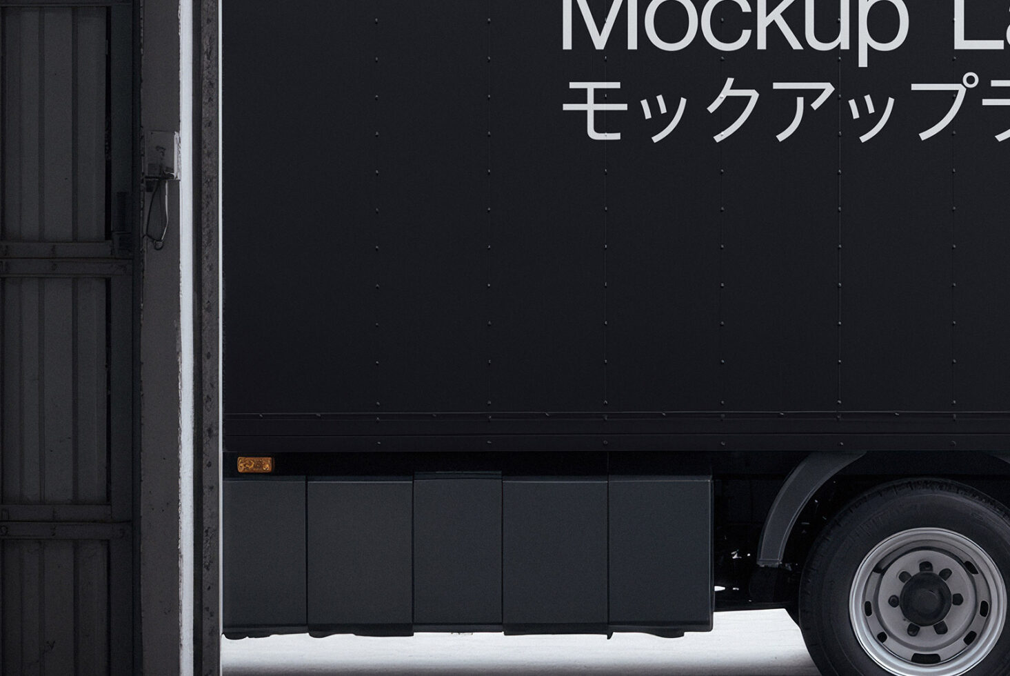 Side view of a black truck mockup parked in a garage emphasizing detailed textures and rivets suitable for vehicle design projects and urban branding.