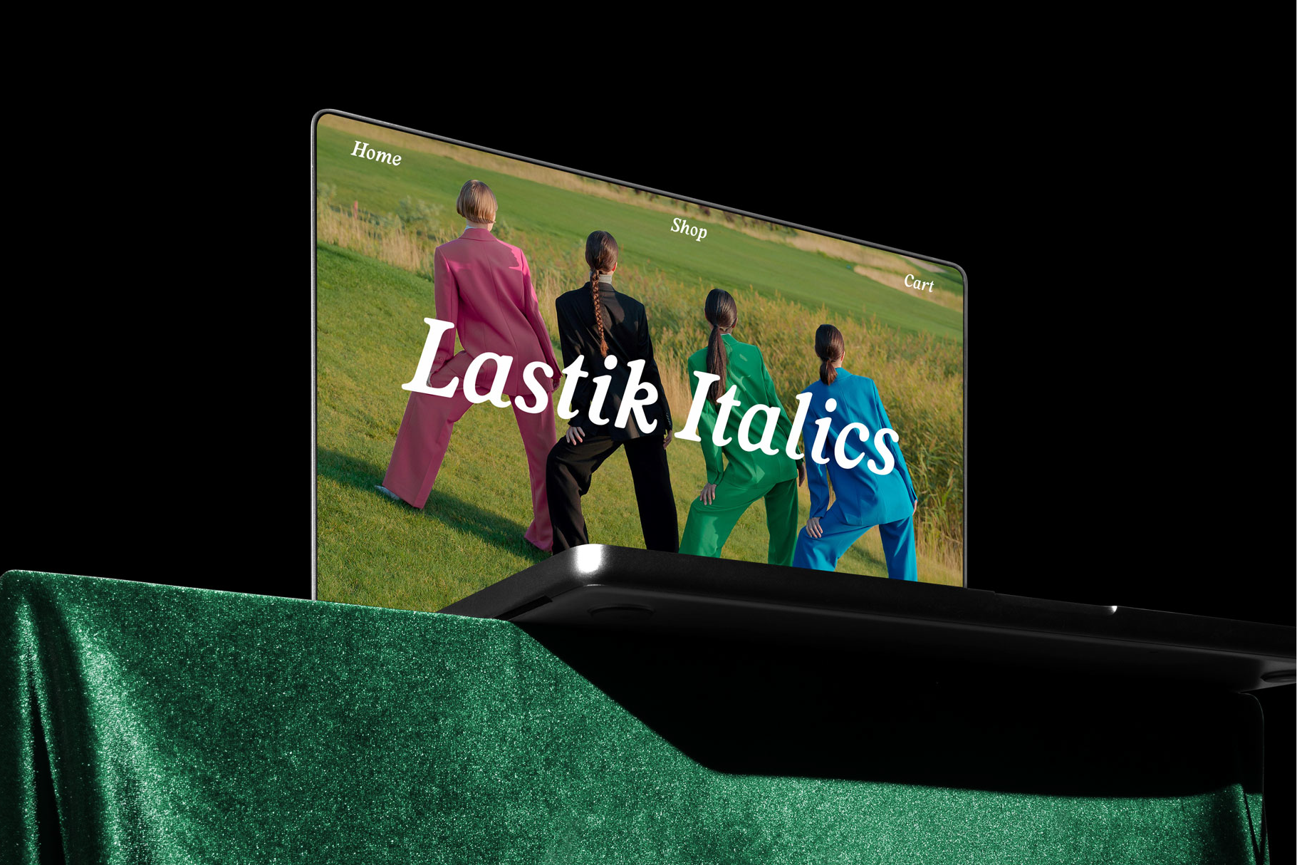 Laptop mockup featuring stylishly dressed figures on screen showcasing Lastik Italics font. Perfect for designers looking for unique typography assets.