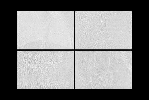 Four high-resolution wrinkled paper textures in a grid layout ideal for digital assets used by designers in mockups and graphic design projects.
