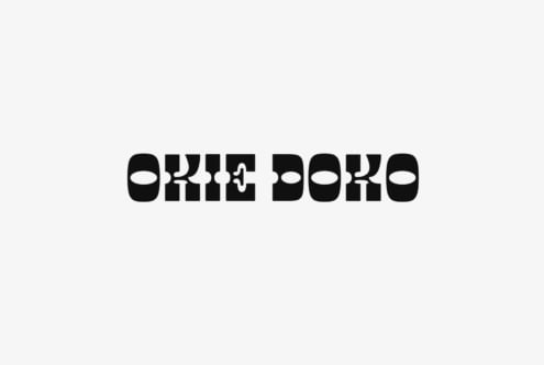 Bold black retro font spelling OKIE DOKO on a light background great for graphic design logos typography designers looking for unique text styles