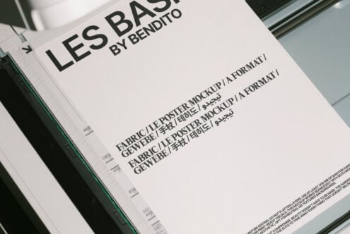 Blank A-format poster mockup in printer tray featuring multilingual text. Ideal for design showcase, templates, marketing presentations, and print media.