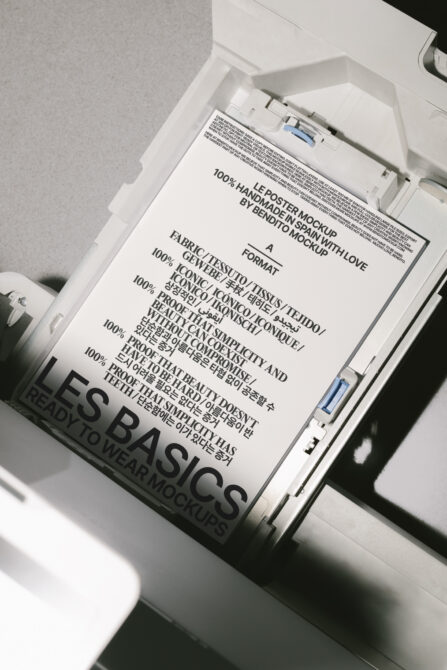 Light poster mockup inside white organizer box showing Les Basics Ready To Wear