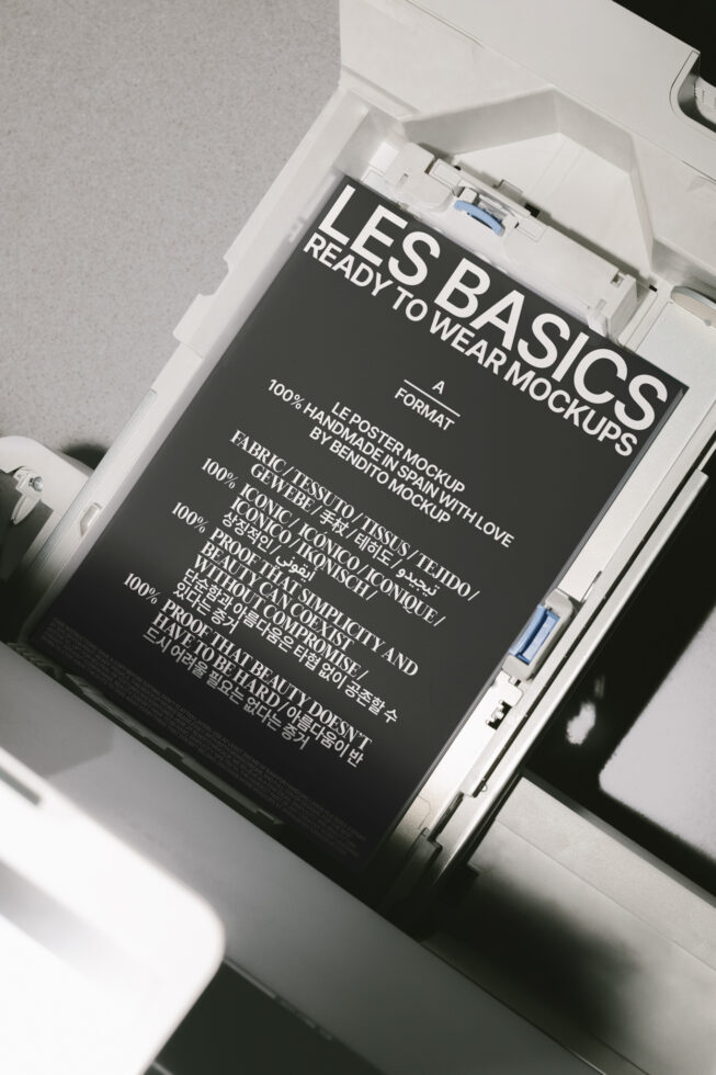 Poster mockup design showcasing Les Basics in an elegant printer setting. Ideal for designers seeking minimalist and high-quality mockup templates.
